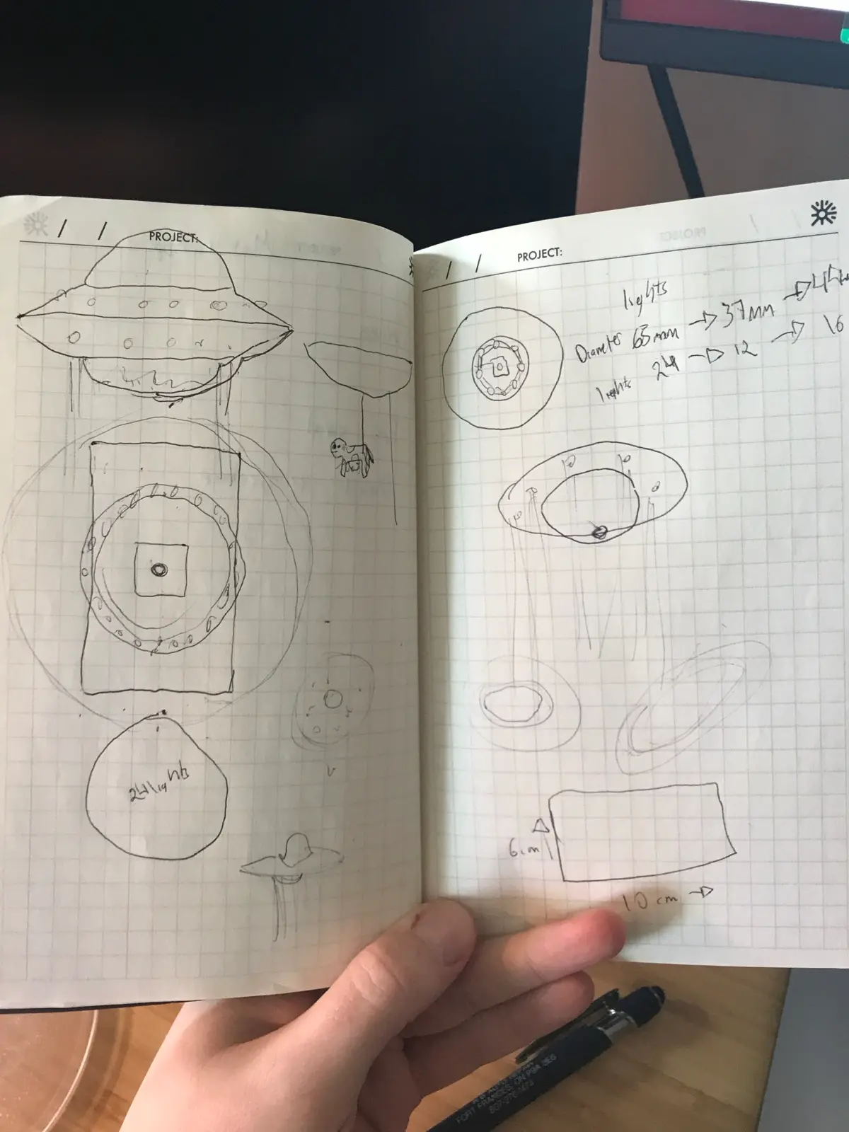 Notebook sketches working out saucer proportions and LED measurements
