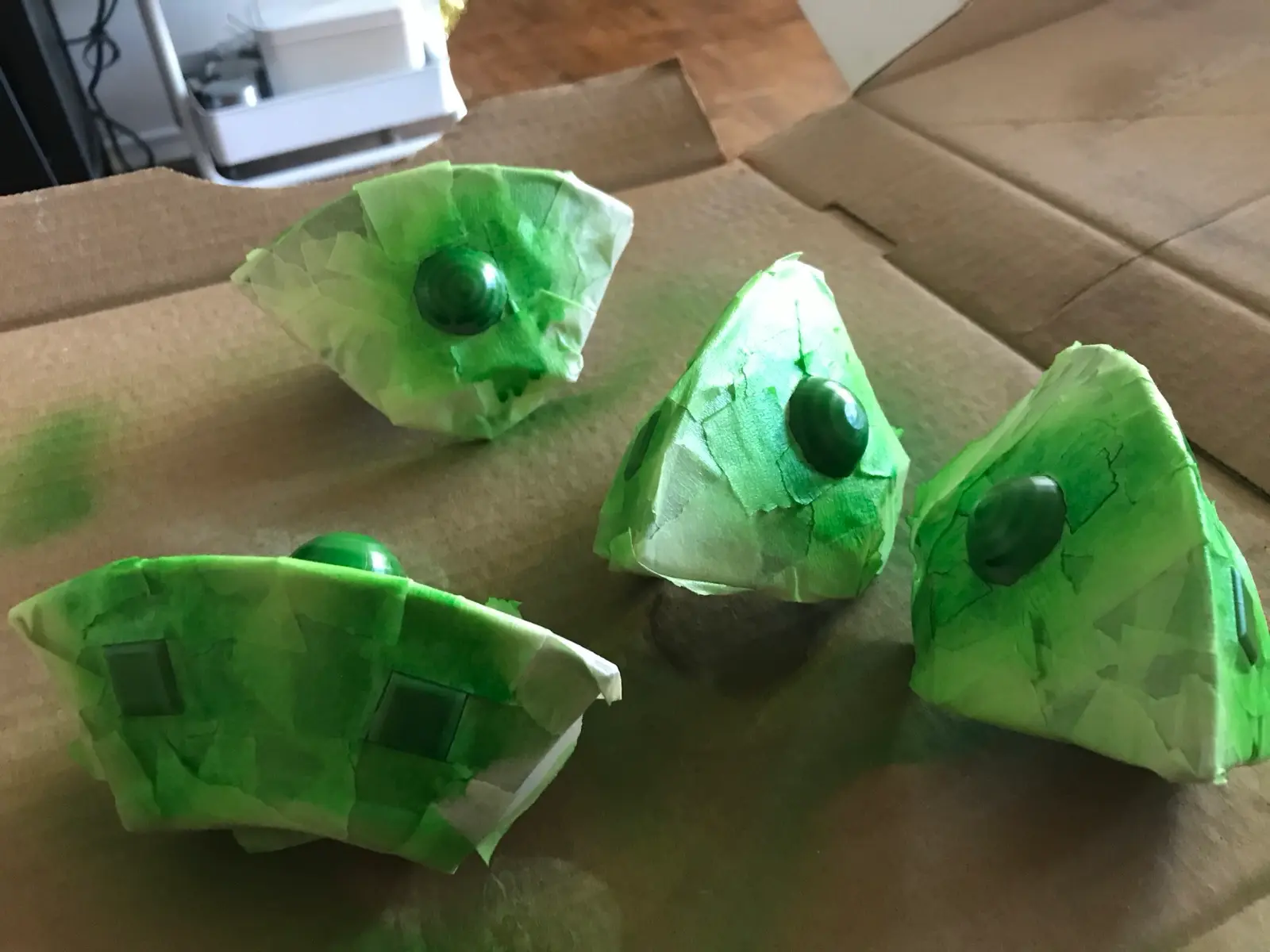 Mini UFOs painted green