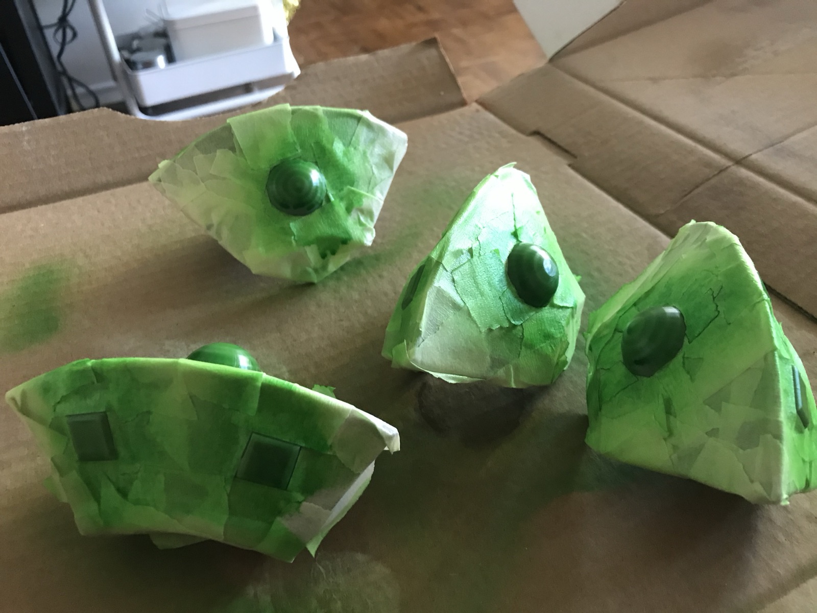 Mini UFOs painted green
